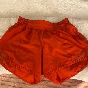 Lululemon carnation red size 2 tall low rise hotty hots in good as new condition